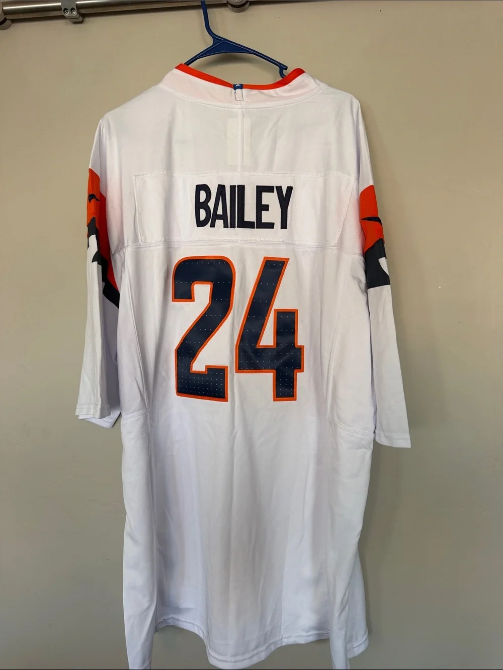 Nike White and Orange Denver Broncos #24 Football Jersey Champ Bailey.